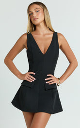 Zareena Mini Dress - V Neck Structured Tulip Pocket Detail Dress in Black